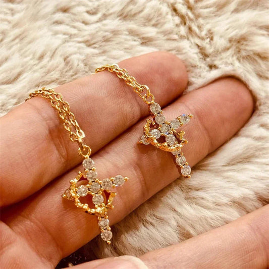 Collana Croce con Corona Rotante